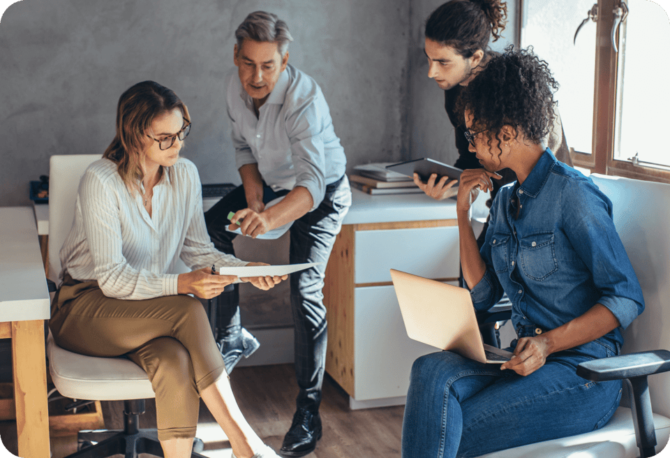 Group of people in an office working together