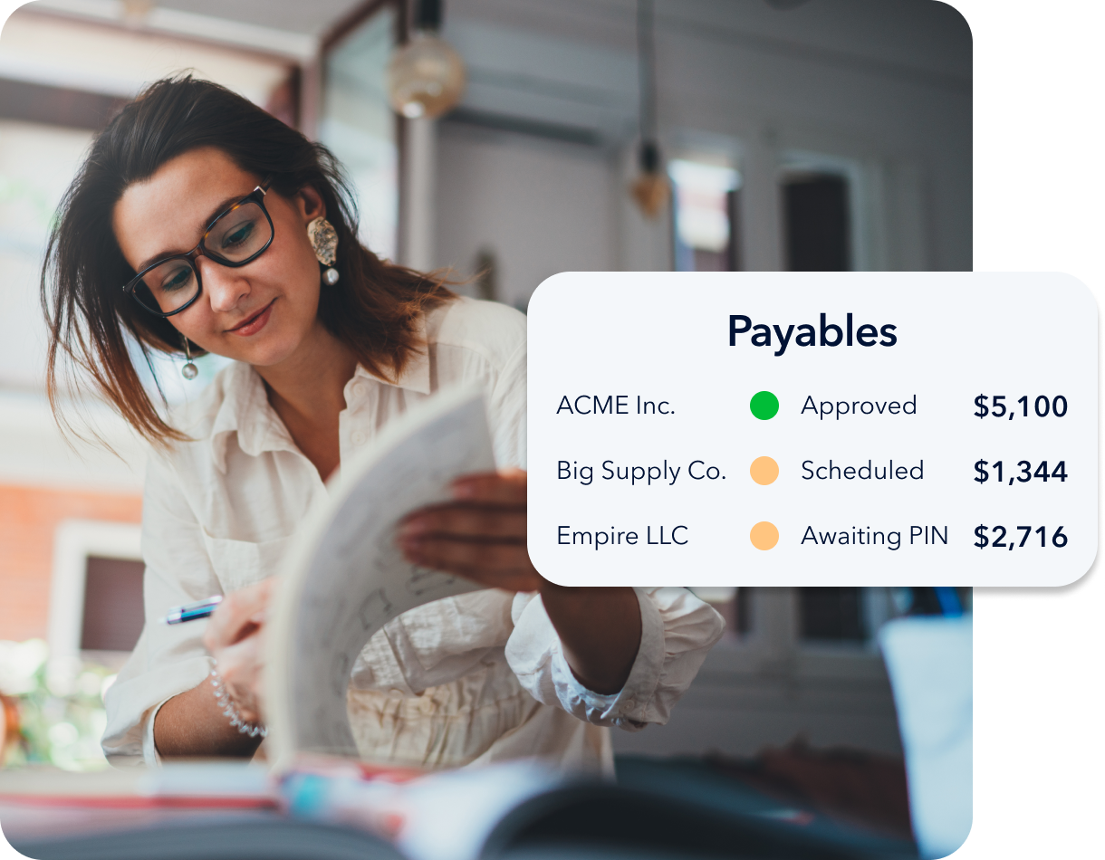 Small business owner managing accounts payable using Plooto’s accounts payable automation software.